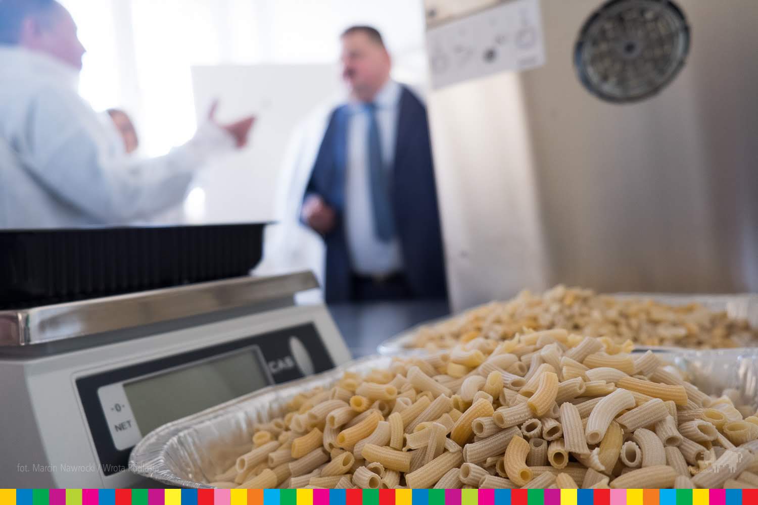 Pasta and people in the background