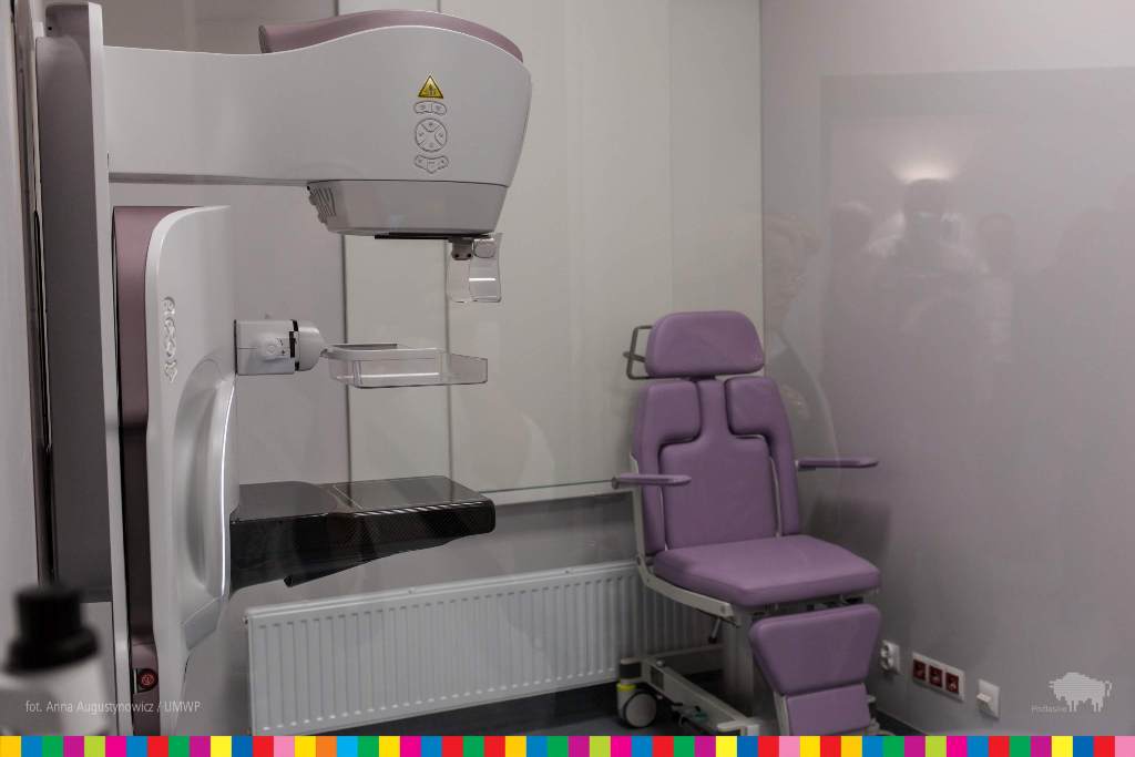 Mammography device, armchair in the background