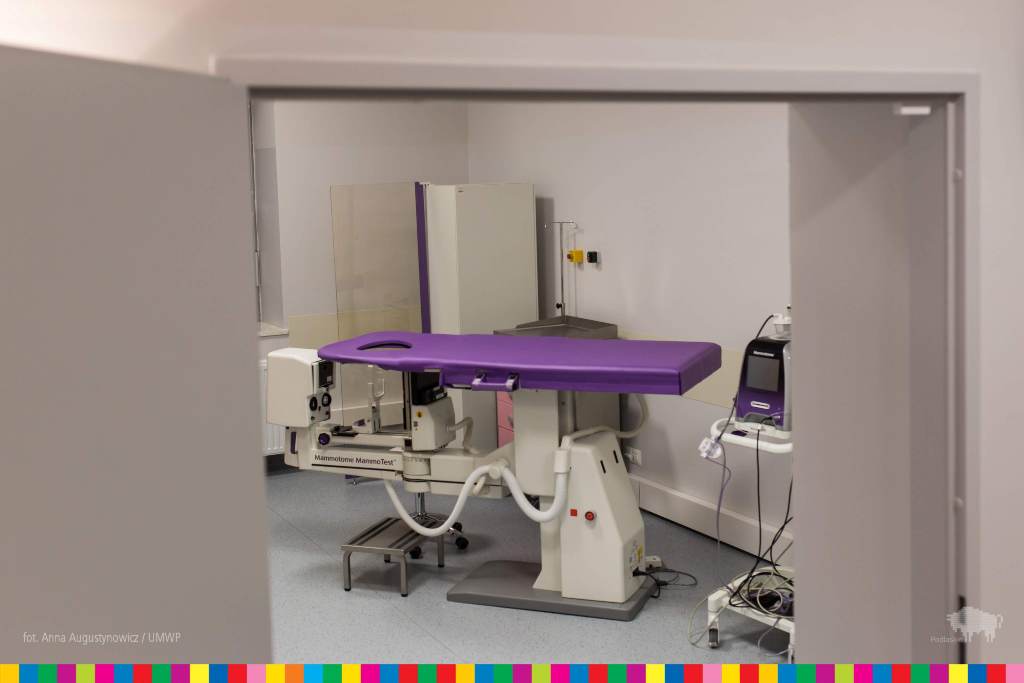 Open door to room with EKG equipment